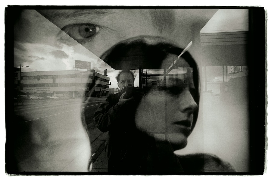 Reflection of photographer in window.